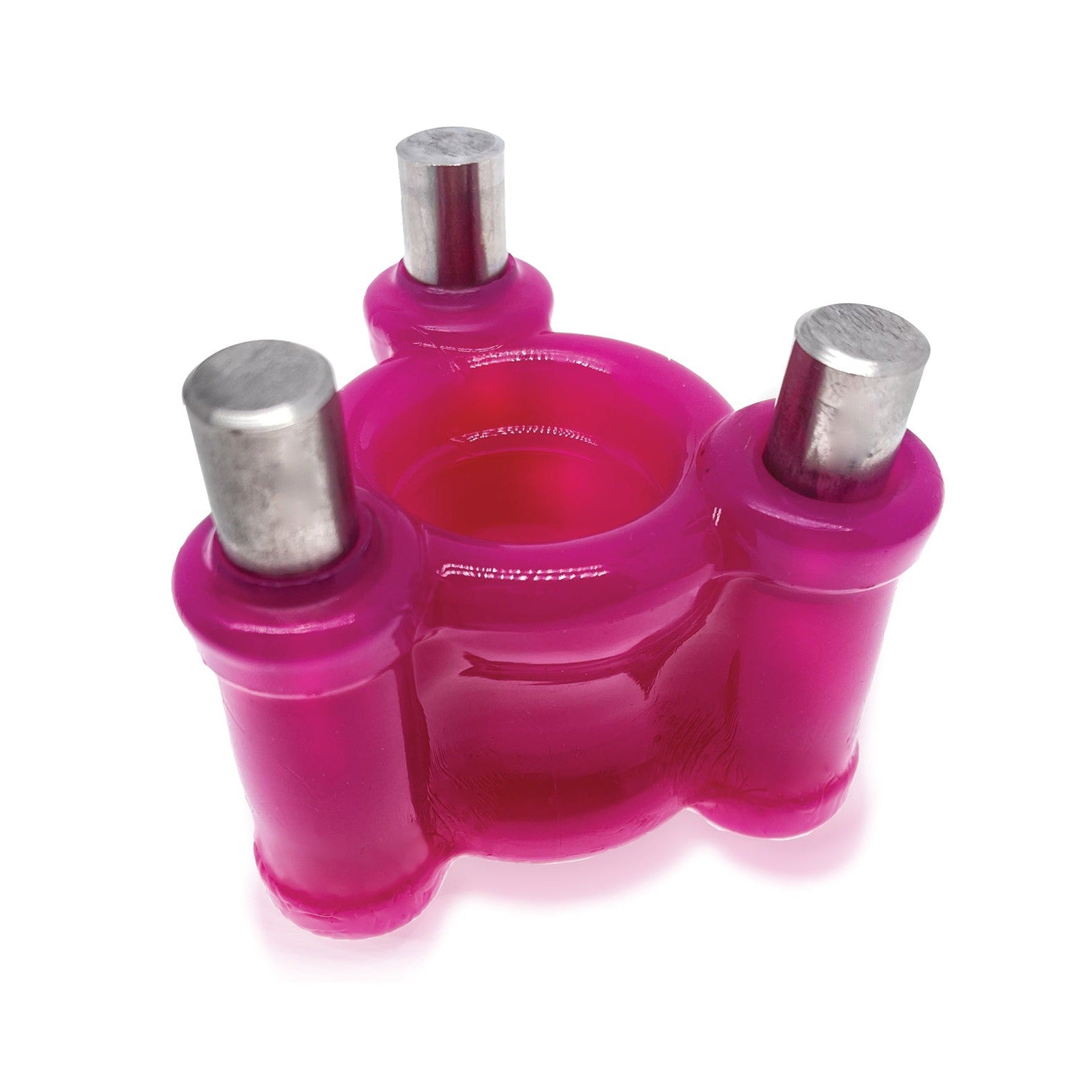 The Oxballs Heavy Squeeze Ballstretcher by Oxballs is a pink silicone tripod stand with three stainless steel pegs, featuring a circular center and evenly spaced columns for stability, reminiscent of stainless steel weights.