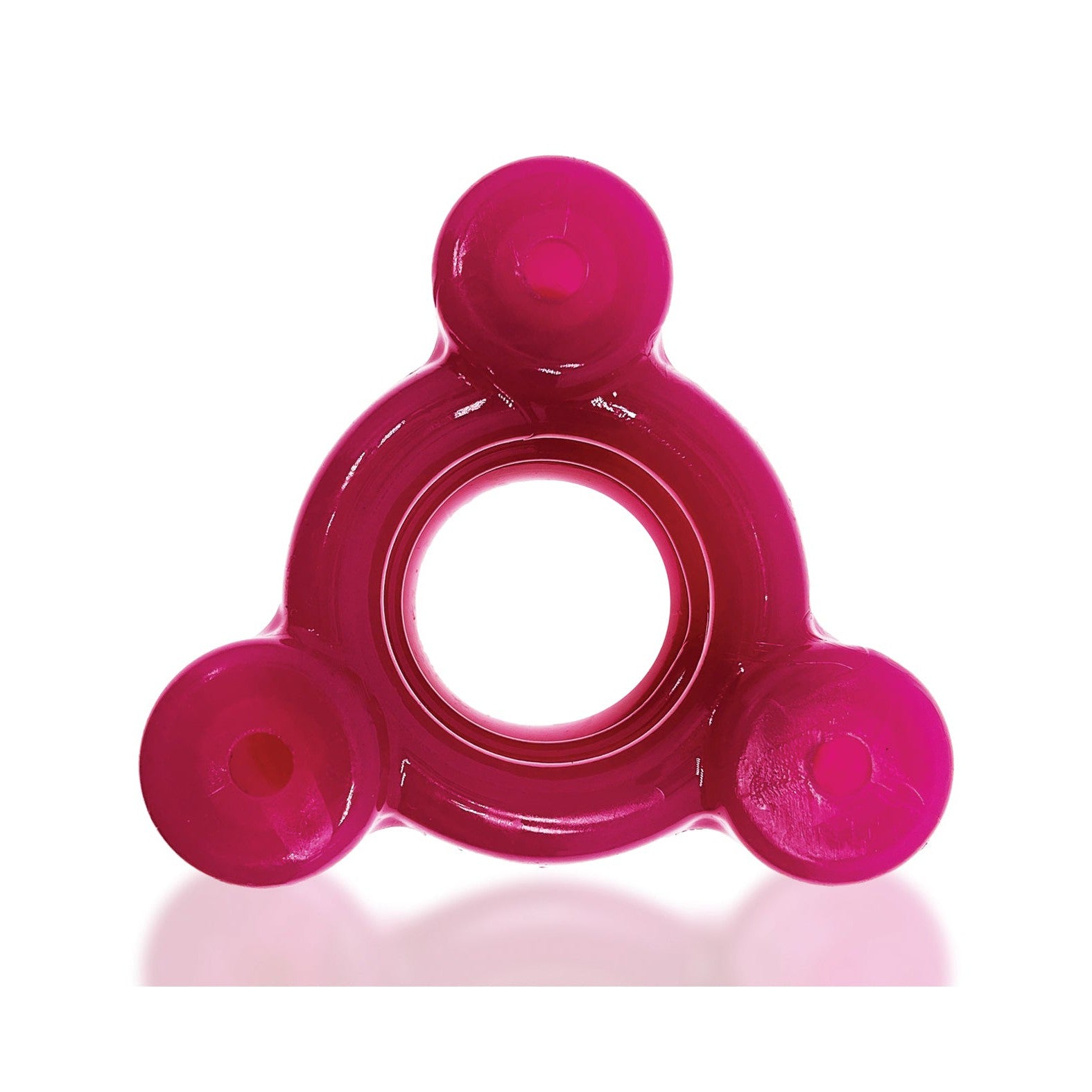 The Oxballs Heavy Squeeze Ballstretcher by Oxballs is a pink, triangular-shaped design with rounded protrusions and a central hollow circle. Its glossy surface and stainless steel weights create a perfectly balanced look.