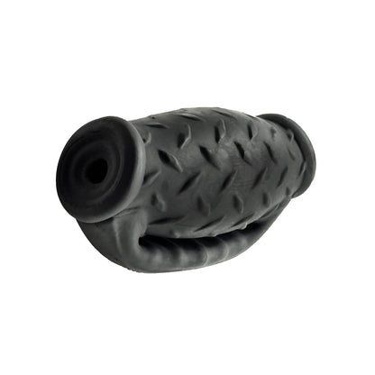 The Oxballs MasterJack Double Penetration Stroker, in a rubber gray finish, features a textured, diamond-patterned surface with hollow ends. Designed for durability and long-lasting enjoyment with Plus+SILICONE, it provides endless fun for pets.
