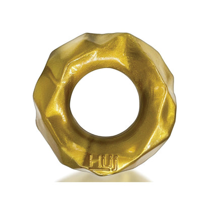A golden, metallic donut-shaped ring with a wavy edge and central hole, made of Plus+SILICONE and embossed with Hüj, reflecting Hunky Junks design style. This is the Hunky Junk Fractal Cockring by Hunky Junk.