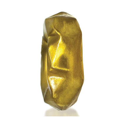 The Hunky Junk Fractal Cockring by Hunky Junk, with its golden, irregular shape featuring a smooth, reflective surface and sharp angular facets, beautifully evokes fractal artistry against a white background.