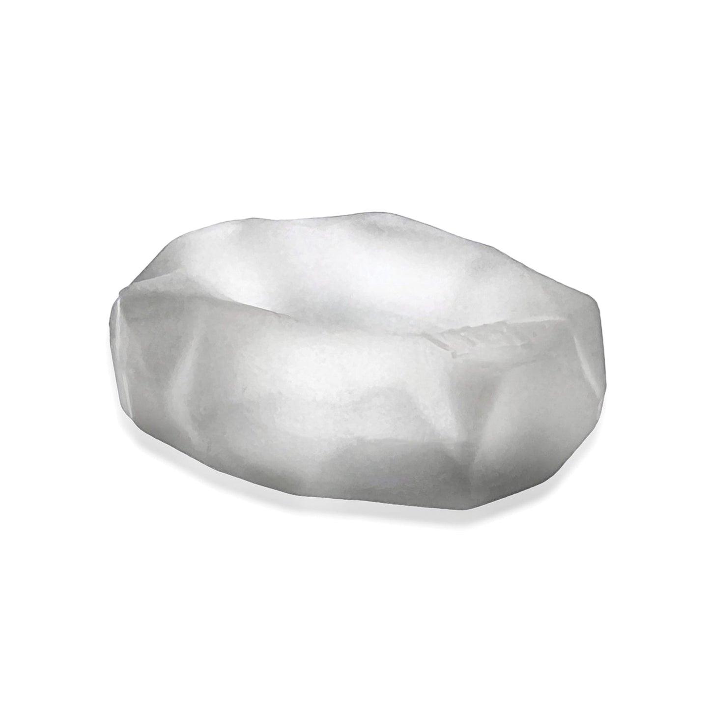 A translucent, irregularly shaped object with a matte finish, resembling a small shallow dish, subtly echoes the design of the Hunky Junk Fractal Cockring by Hunky Junk. Set against a plain white background, it invites curiosity and exploration.