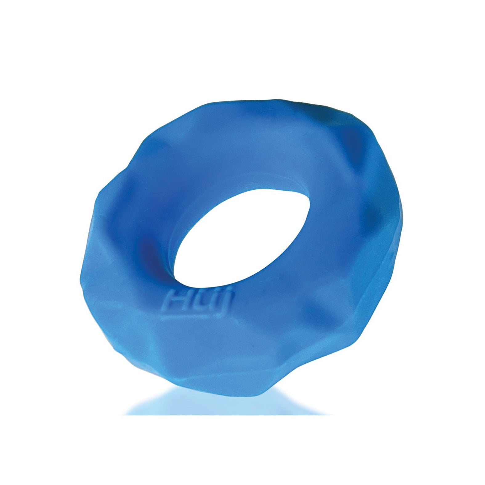 A blue, textured, donut-shaped Hunky Junk Fractal Cockring lies against a white backdrop, reflecting the innovative designs of Hunky Junk.