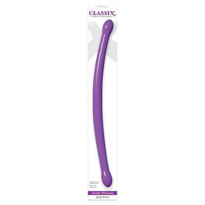 The Pipedream Classix 18 Bendable Double Whammy, a purple double-ended toy with a flexible shaft, is long and slightly curved with rounded ends. Its packaging features branding and product information, ideal for double penetration enthusiasts.