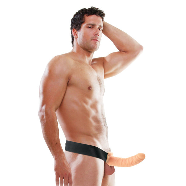 Shirtless man wearing the Fetish Fantasy Series 8 inch hollow strap-on: flesh-tone veined hollow cock on a wide black elastic waistband