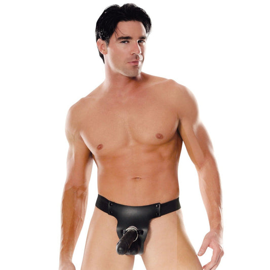 A man wears a black Fetish Fantasy Series Mr. Big Hollow 8 Strap-On against a plain white background, maintaining a neutral expression, with dark hair and a toned physique.