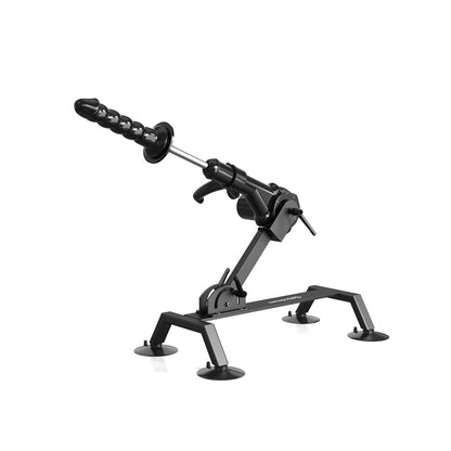 The Fetish Fantasy Series Body Dock Sex Machine by Fetish Fantasy is a sleek, black adjustable device with a powerful thrusting motor and suction cups for stability. It includes a textured handle on the rod, presented against a clean white background for emphasis.