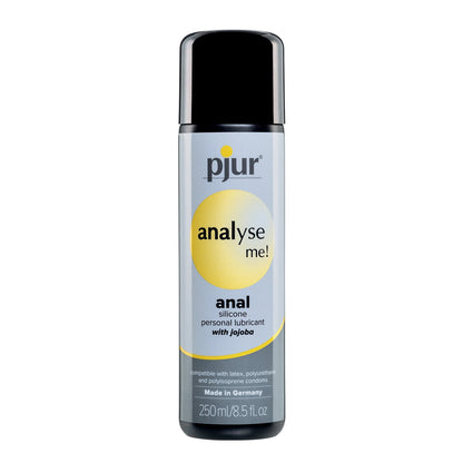 The 250ml Pjur Analyze Me! Relaxing Anal Glide Silicone features a light gray label and black cap, highlighted by a yellow info circle. Its formula is compatible with latex, polyurethane, and polyisoprene condoms. Made in Germany.