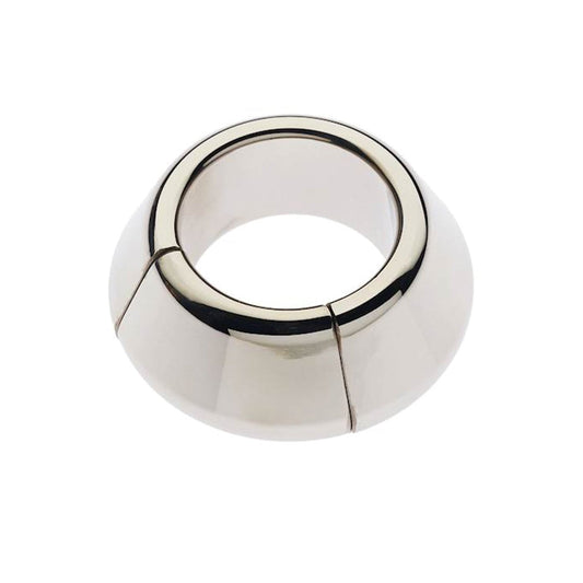 The Plesur Heavy Cone Magnetic Ball Stretcher by Plesur is a shiny, stainless steel ring with a wide base and narrow top. It has a smooth, polished surface with two vertical seams and resembles a conical collar. A magnetic closure ensures a secure fit.