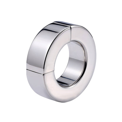 The Plesur Magnetic Ball Stretcher by Plesur is a polished, circular ring made of stainless steel with a secure hinge mechanism. Its smooth surface reflects light beautifully, making it ideal for ball stretching practices.