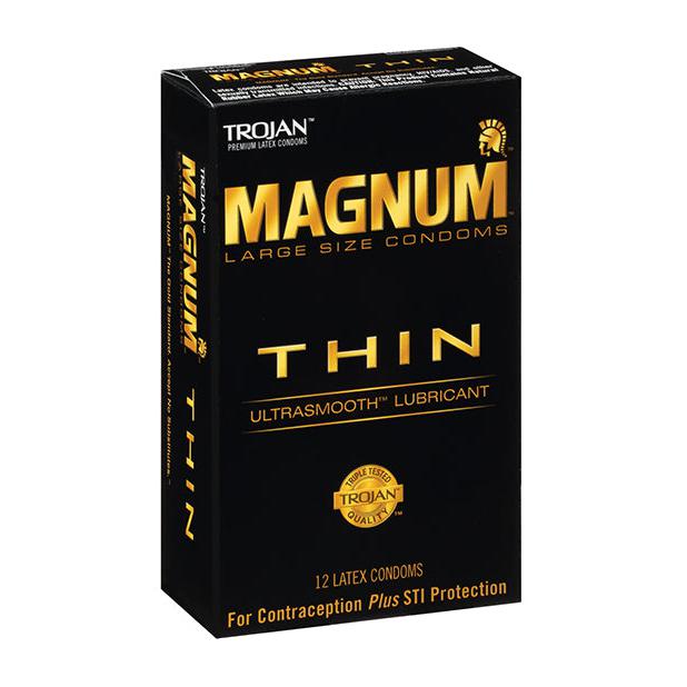 A sleek black box of Paradise Marketings Trojan Magnum Thin condoms contains 12 large latex condoms with an ultra-thin design for contraception and STI protection. The package features Ultrasmooth lubricant, bold gold lettering, and a trusted Trojan quality seal.