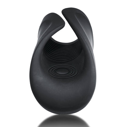 The Rocks Off Rush Rechargeable Stroker by Rocks Off is a black silicone male sex toy featuring a flexible, waterproof design with a textured interior and curved edges. This powerful, palm-sized stroker is shown vertically on a reflective surface.