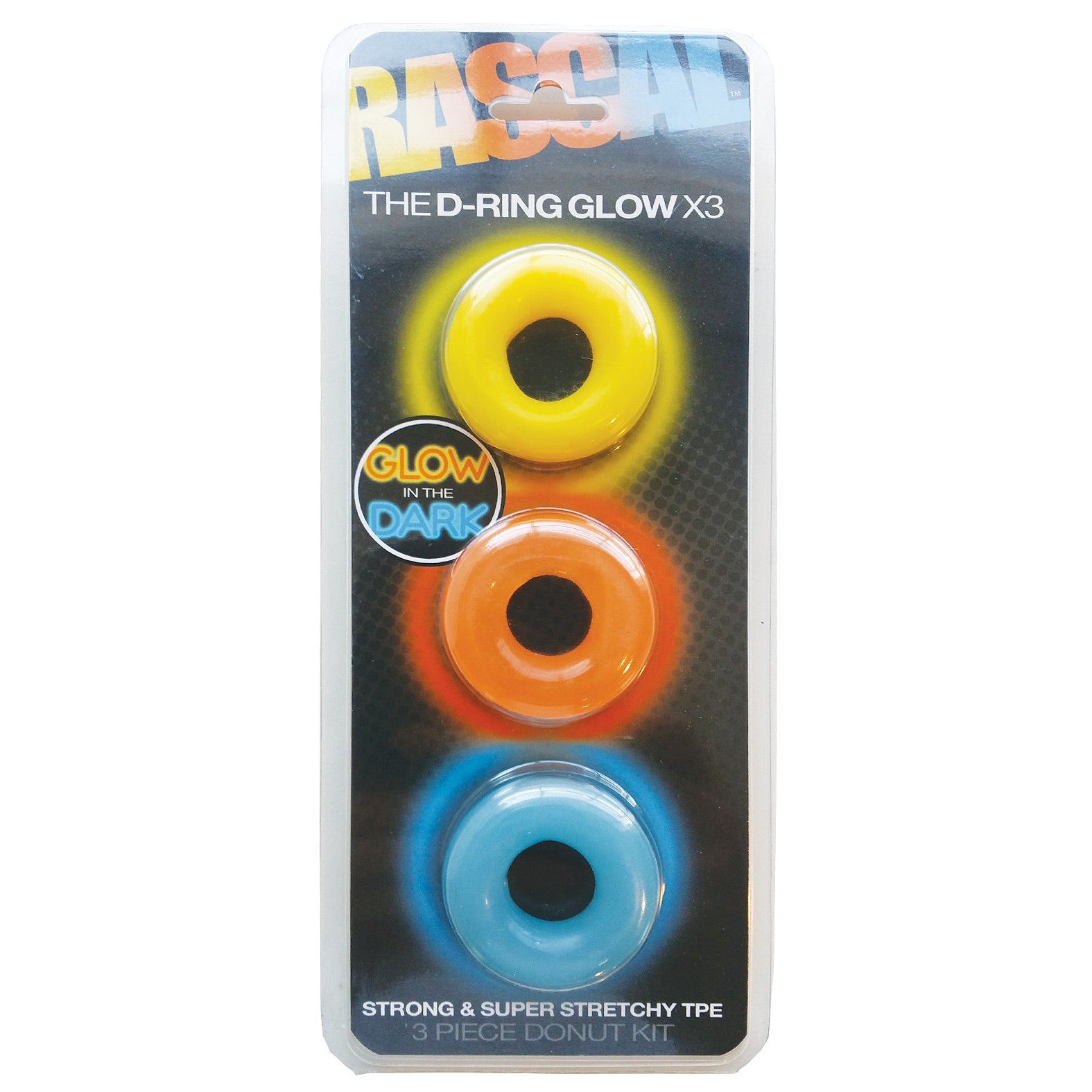Packaging of the Rascal The D-Ring Glow X3 by Rascal Toys showcases three vibrant glow-in-the-dark cockrings in yellow, orange, and blue. Text highlights the strong & super stretchy TPE and 3 piece donut kit.
