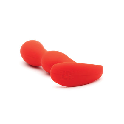 The Sport Fucker Crossfit Plug is a red, curved, ergonomic plug made from medical-grade silicone with a smooth surface, displayed on a white background.