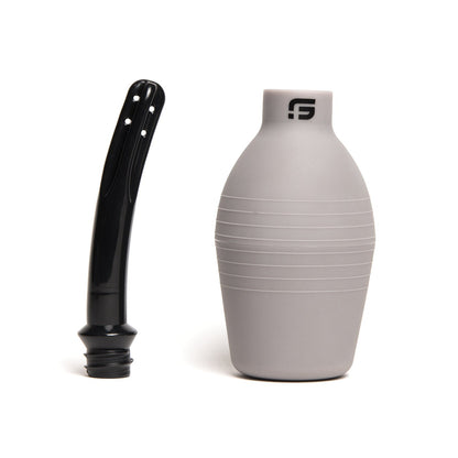 The Sport Fucker Locker Room Universal Bulb, a gray ribbed 16 oz container with a black angled nozzle featuring multiple small holes, offers a large capacity perfect for versatile use.