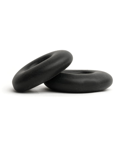 Two black Sport Fucker Stacker Rings stacked, side view