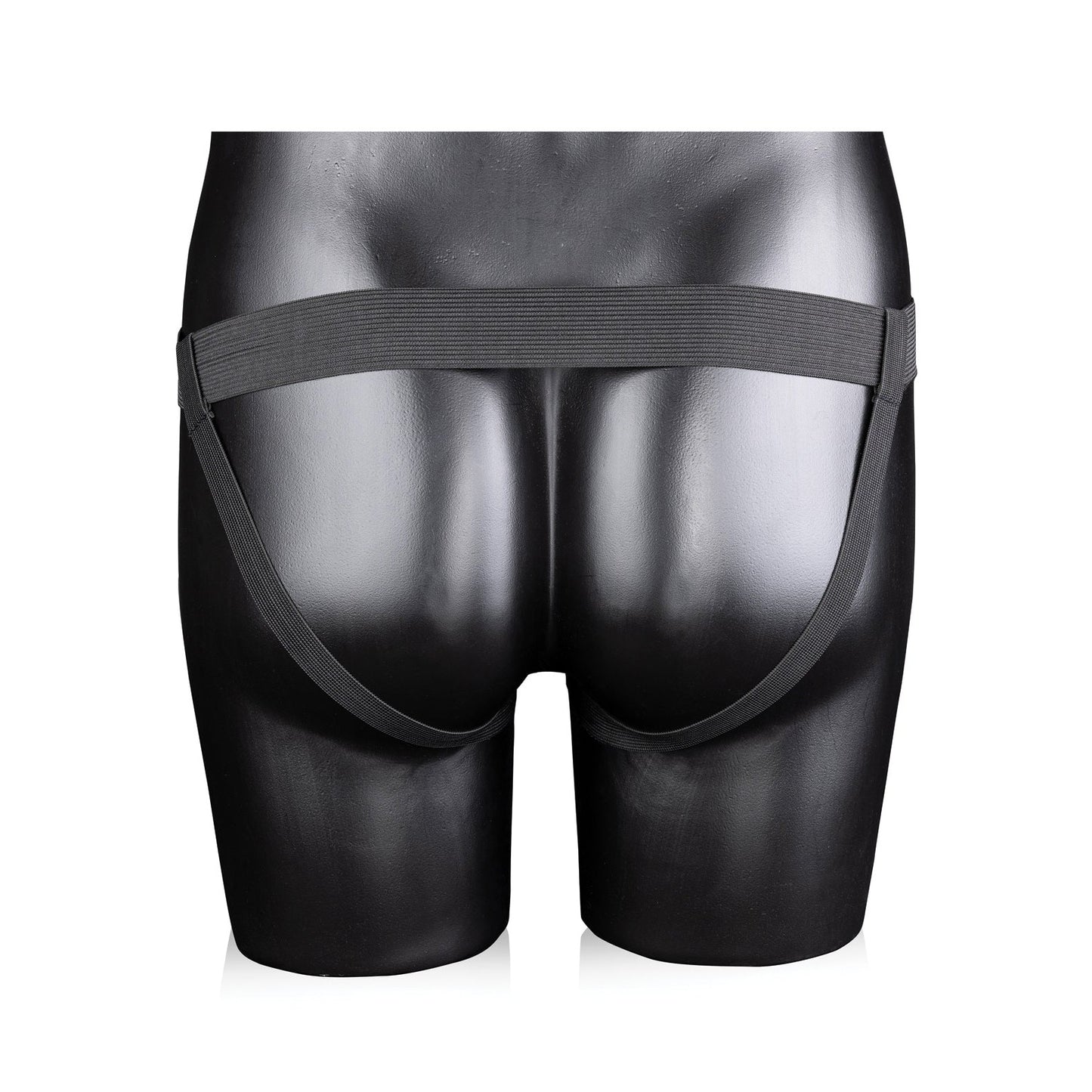 A black mannequin displays the Shots Ouch 8 Ribbed Hollow Strap On With Balls against a white background, featuring a sleek, phthalate-free waistband and minimalist design. From behind, two straps elegantly hug the hips.