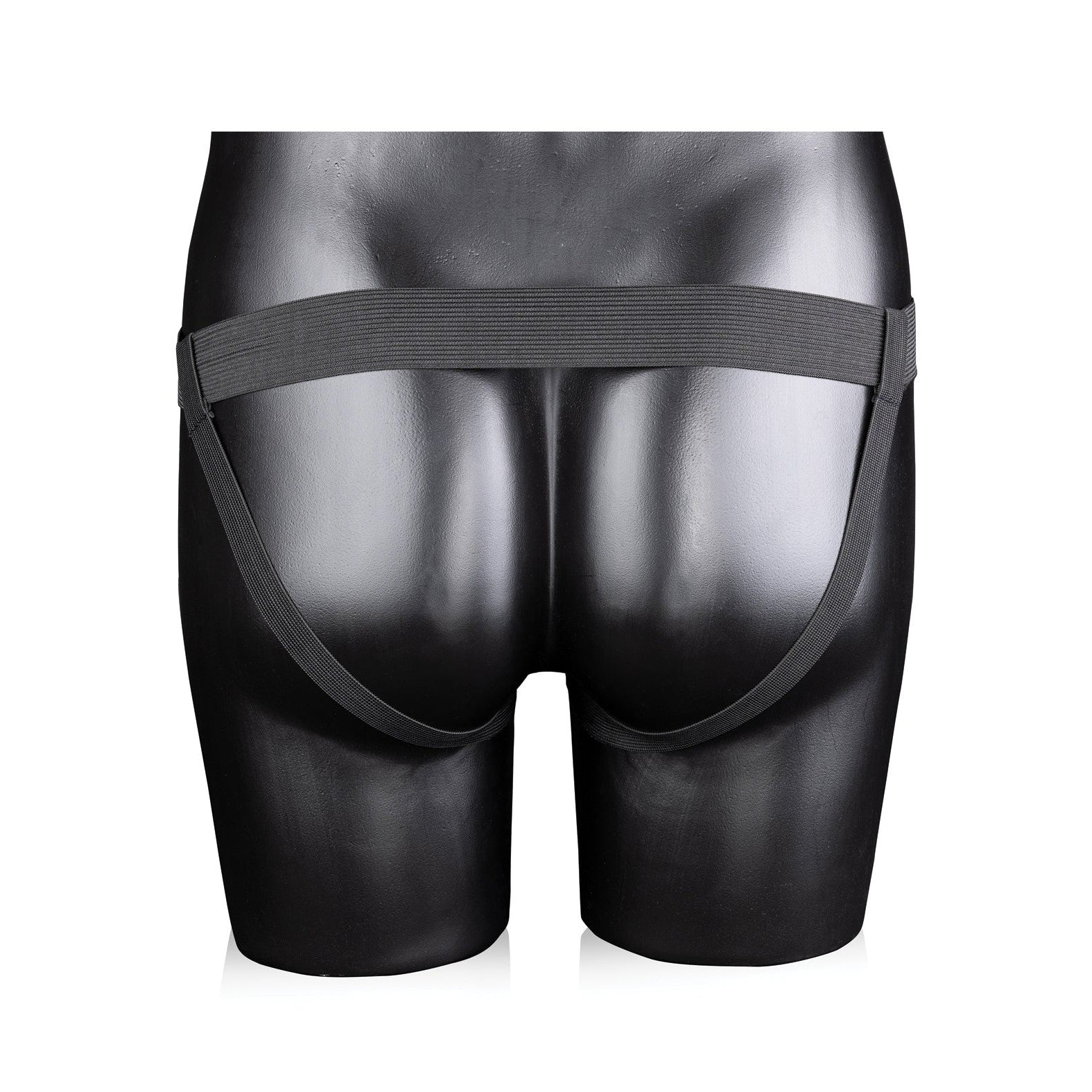 A black mannequin displays the Shots Ouch 8 Ribbed Hollow Strap On With Balls against a white background, featuring a sleek, phthalate-free waistband and minimalist design. From behind, two straps elegantly hug the hips.