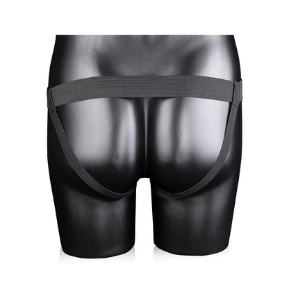 A black mannequin displays the Shots Ouch 8 Ribbed Hollow Strap On With Balls against a white background, featuring a sleek, phthalate-free waistband and minimalist design. From behind, two straps elegantly hug the hips.