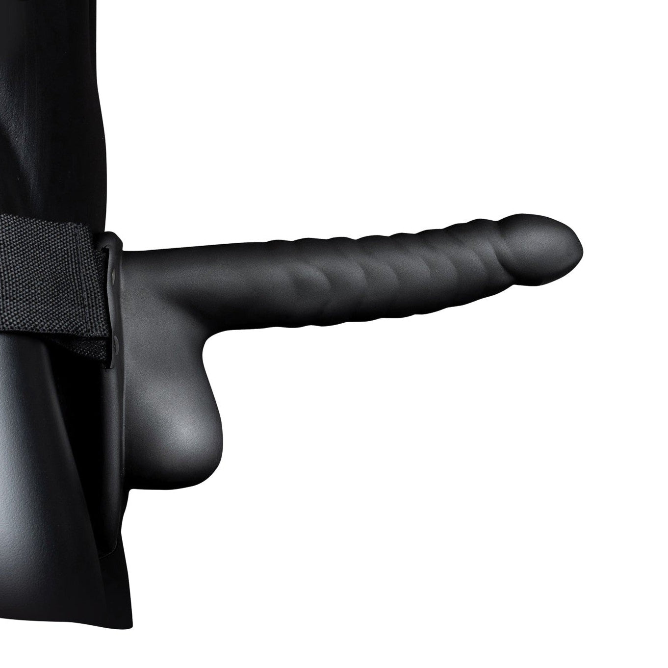 The Shots Ouch 8 Ribbed Hollow Strap-On With Balls in black features a ribbed texture and ergonomic shape, secured to a waist strap. Made from body-safe, phthalate-free materials, it includes a side handle for support, and its design is accentuated by the sophisticated curved form.