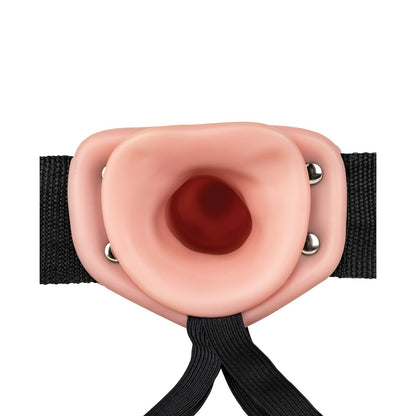 The image showcases the Shots RealRock Vibrating Hollow Strap-On With Balls, a pink silicone mouthpiece with an adjustable black strap, a wide circular shape, metal fasteners on each side, and multi-speed vibrations for enhanced comfort and functionality.