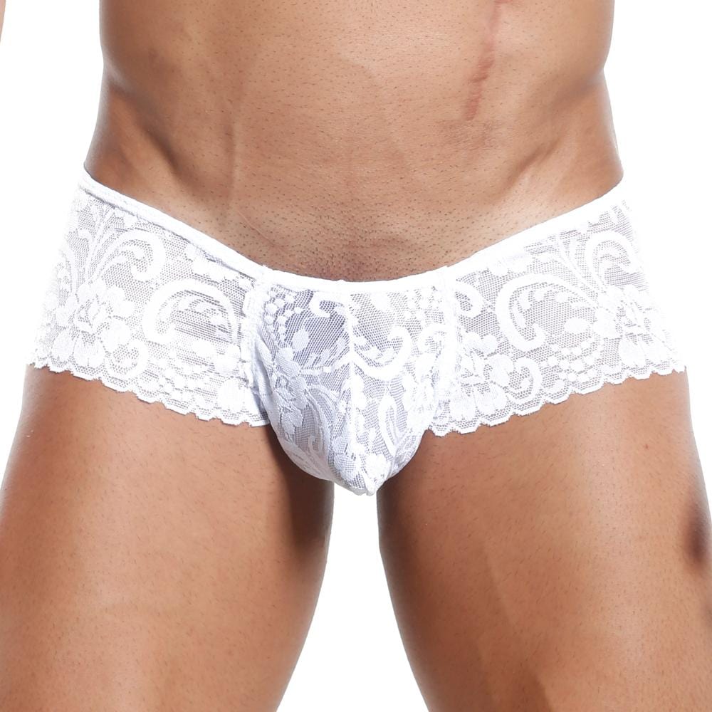 A person is wearing the Secret Male Slip Bikini, showcasing its intricate floral lace design. The photo highlights the lower torso, emphasizing the flexible fit and detailing characteristic of Secret Males craftsmanship.