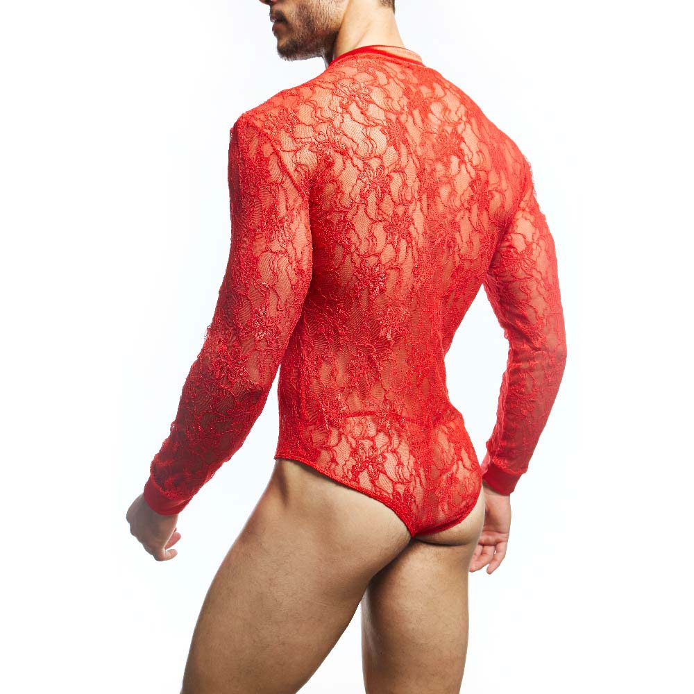 A person models the Secret Male Mens Lingerie Sexy Bodysuit, featuring a sexy red lace with an alluring floral pattern. Its long sleeves and body-hugging fit are enhanced as they stand against a white background, slightly turned from the camera.