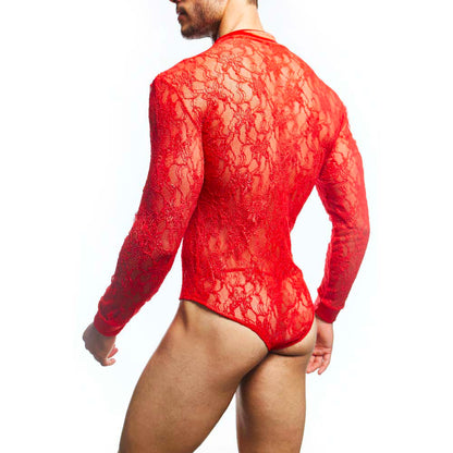 A person models the Secret Male Mens Lingerie Sexy Bodysuit, featuring a sexy red lace with an alluring floral pattern. Its long sleeves and body-hugging fit are enhanced as they stand against a white background, slightly turned from the camera.