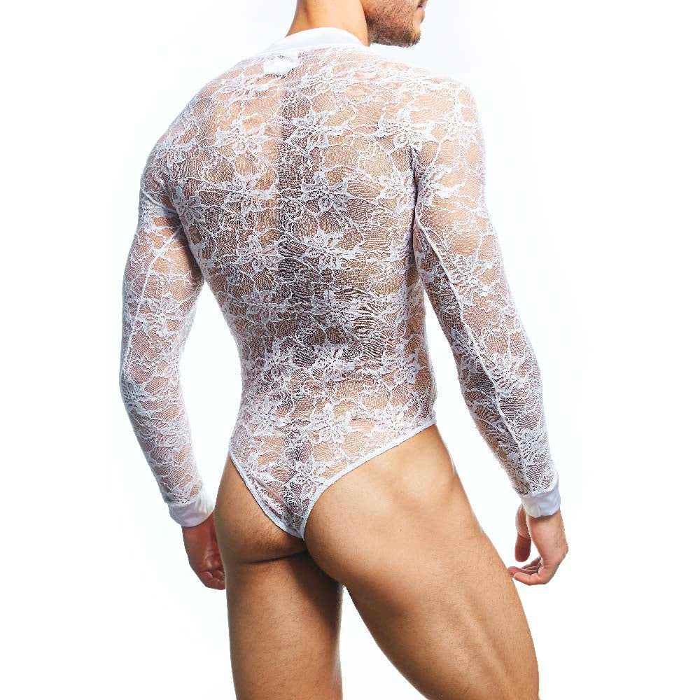 In a plain white setting, someone models the Secret Male Mens Lingerie Sexy Bodysuit by Secret Male, showcasing its alluring sheer lace fit with an intricate back pattern as they face away from the camera.