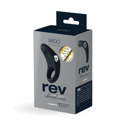 A sleek black box showcases the VeDO Rev Rechargeable C Ring, featuring VeDO at the top and an image of a silky silicone black vibrating ring. It highlights powerful vibes with 10 modes. Over 5 million VeDO toys sold testifies to its popularity.