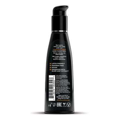 The Wicked Sensual Care Aqua Waterbased Lubricant, by Wicked Sensual, comes in a sleek black bottle with a pump top. It features crisp white text emphasizing its latex-friendly, paraben-free, and olive leaf extract-infused formula. This vegan natural lubricant ensures a gentle experience with the barcode and brand logo neatly at the bottom.