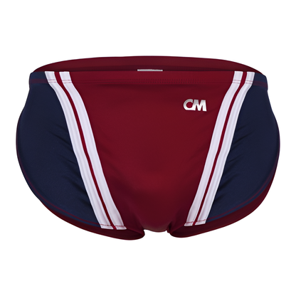 The Cover Male Running Shorts for men are maroon and navy with a soft, stretchy fit, featuring white vertical side stripes. They have CM printed on the front and include a contour pouch for comfort.