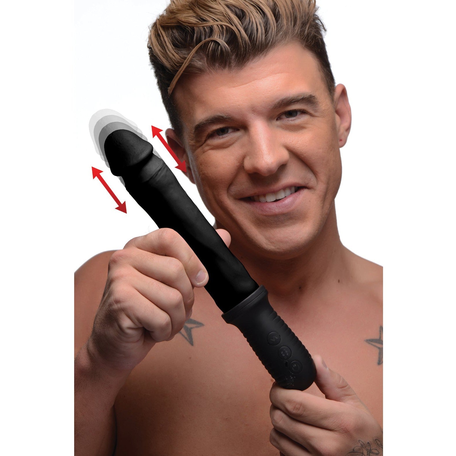 A person with short hair smiles while holding the Master Series 8X Auto Pounder Vibrating & Thrusting Dildo, a black wand-shaped device. It features powerful vibrations, a textured grip, and buttons near the base with arrow indicators. The white background highlights its realistic design and functionality.