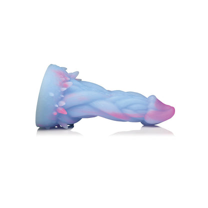 The Creature Cocks Nomura Jellyfish Silicone Dildo is a fantasy-inspired item with a twisted design and pointed tip. It features an oceanic blue-pink gradient and bumpy texture, reminiscent of its namesake, all displayed on a plain white background.