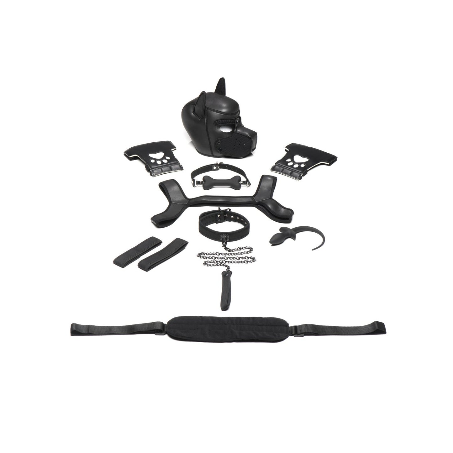 The Master Series Pup Arsenal Set by Master Series, featuring a neoprene pup hood, black dog mask, two cuffs, harness, collar, leash, and black handles, is elegantly displayed on a white background.