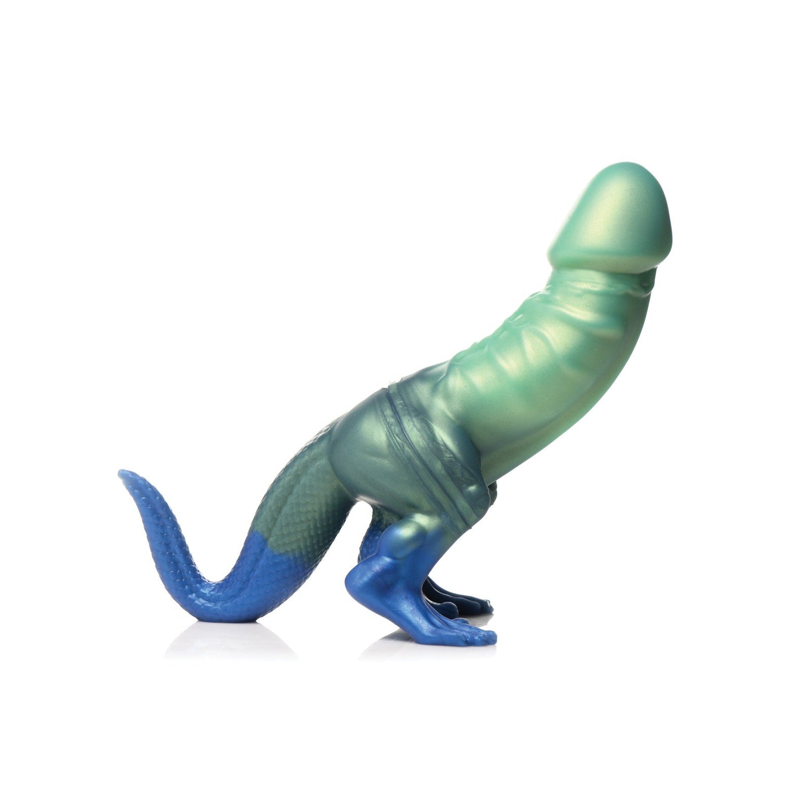 The Creature Cocks Jurassic Cock Dinosaur Silicone Dildo by Creature Cocks is a vibrant toy with a green-to-blue gradient mimicking a prehistoric hybrid. It boasts a scaly texture, lizard-like tail, and upright stance on four legs. The smooth upper part contrasts the textured bottom, ideal for fantasy roleplay.