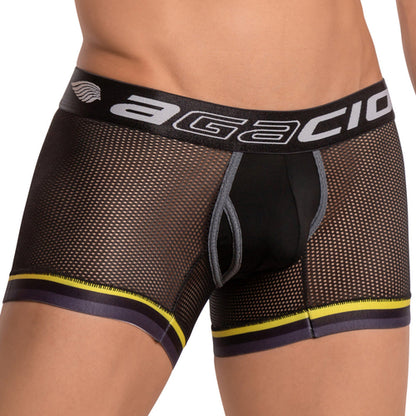 The Agacio Atlantis Boxer Trunk is a stylish mens underwear item made of black mesh fabric with gray and yellow accents, offering a sporty, form-fitting look. Its comfortable waistband showcases the Agacio logo, making it an essential addition to any wardrobe.
