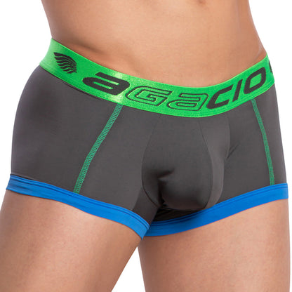 A person is wearing Agacio Stretch Boxer Trunk in gray and blue, with a comfortable green waistband featuring Agacio in black. It includes a contoured, double-stitched pouch and visible stitching for style and durability.