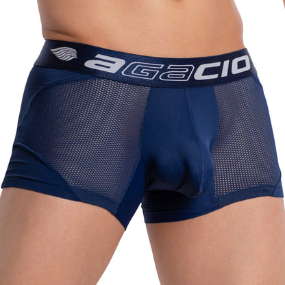 A person flaunts the Agacio Athletic Mesh Boxer Trunk in navy blue, featuring a branded waistband. Its breathable fabric is semi-sheer on the sides, emphasizing the lower torso.