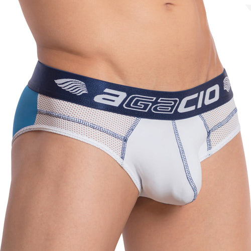 Close-up of a person wearing Agacio The Charged Brief featuring breathable mesh details. The waistband is shiny dark blue with Agacio in bold white letters.