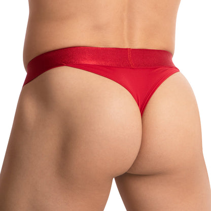 A close-up shows the confident fit of a person in bright red Agacio V-Shaped Pouch Thong, viewed from behind. The light skin contrasts with the smooth fabric, emphasizing the sleek design and bold color of this daring Agacio underwear choice.