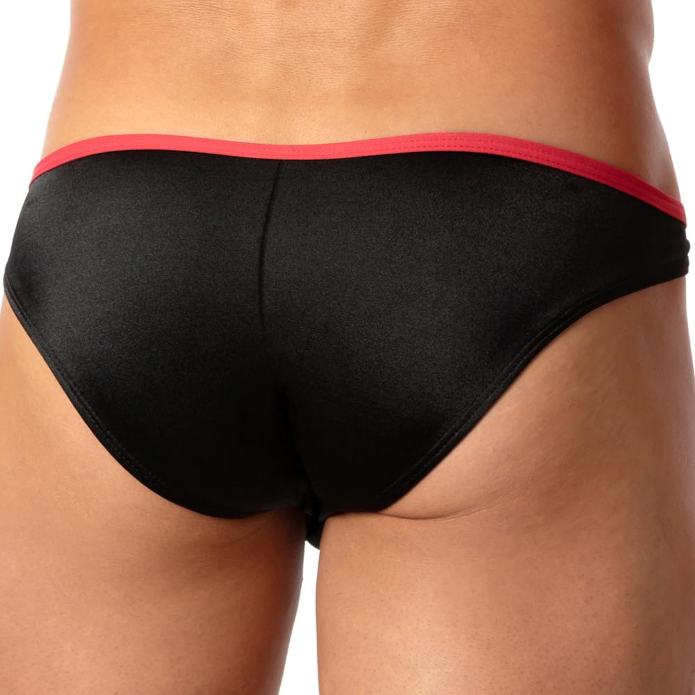The image features the Cover Male Conch Bikini by Cover Male, showcasing black bottoms and a vivid red waistband from the back. Made of fast-drying fabric, it offers all-day comfort against light skin tones while emphasizing the sleek design.