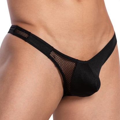 A person wears the Cover Male Mesh Pouch Bikini by Cover Male, showcasing black mesh-style underwear with a solid front panel and low-rise waistband, emphasizing the polyamide-spandex texture.