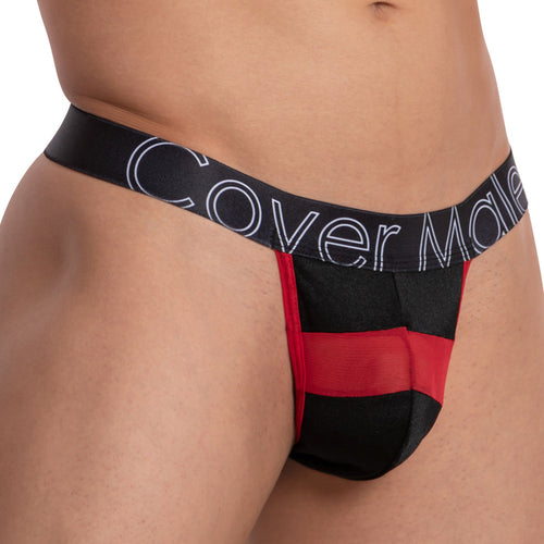 A person is wearing a black and red Cover Male Focus Thong, made of sheer and solid fabric, with the brand Cover Male visible on the waistband.