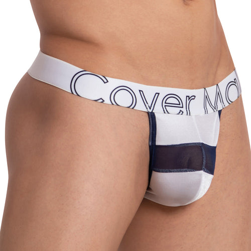 A side view image shows a person wearing the Cover Male Focus Thong in white and navy blue, featuring an elastic waistband with Cover Male branding. The stylish design blends sheer and solid panels, highlighting the midsection while keeping the face out of view.