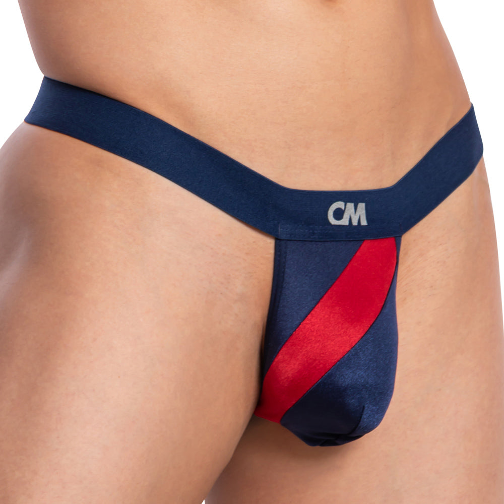 Close-up of someone wearing the Cover Male Bi-Color Sexy Thong, highlighted by its supportive pouch for comfort and a waistband with CM initials.
