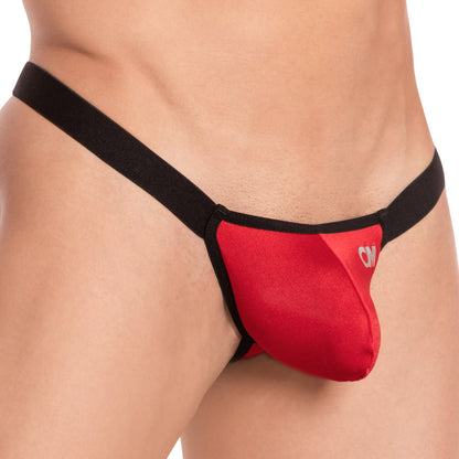 The Cover Male Flex Thong features a vibrant red front paired with a black waistband and trim, all designed for ultimate comfort and style.