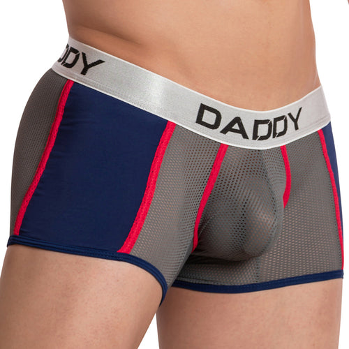 Someone is wearing Daddys Daddy Pride Boxer underwear with breathable mesh fabric, a silver waistband labeled DADDY, in dark blue and gray with red accents, emphasizing the waist and upper thighs.