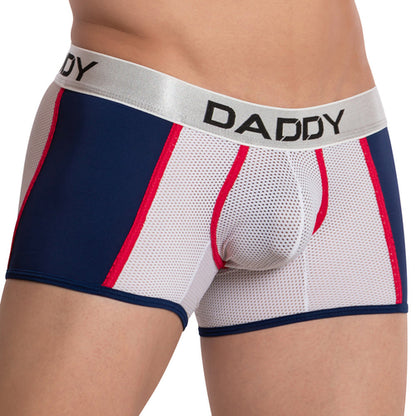 A person wearing Daddy Pride Boxers by Daddy, featuring a breathable mesh design with blue, white, and red stripes. The supportive waistband is metallic and displays DADDY.