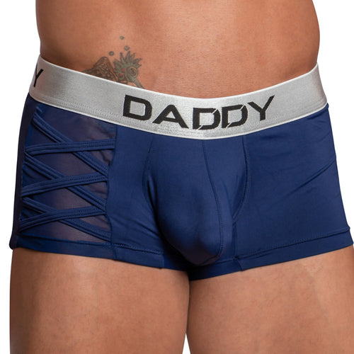 A person wears the Daddy Criss-Cross Side Mesh Boxer by Daddy, featuring blue color and a silver waistband displaying DADDY with stylish side mesh paneling.